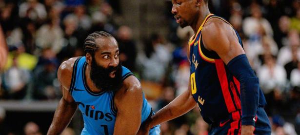 九城游戏中心官网-JackeyLove在勇士比赛中出色防守，比赛局势复杂引发热议！